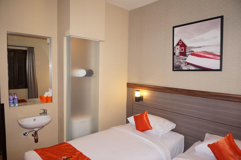 Ekon Hotel Yogyakarta Pokoj fotografie